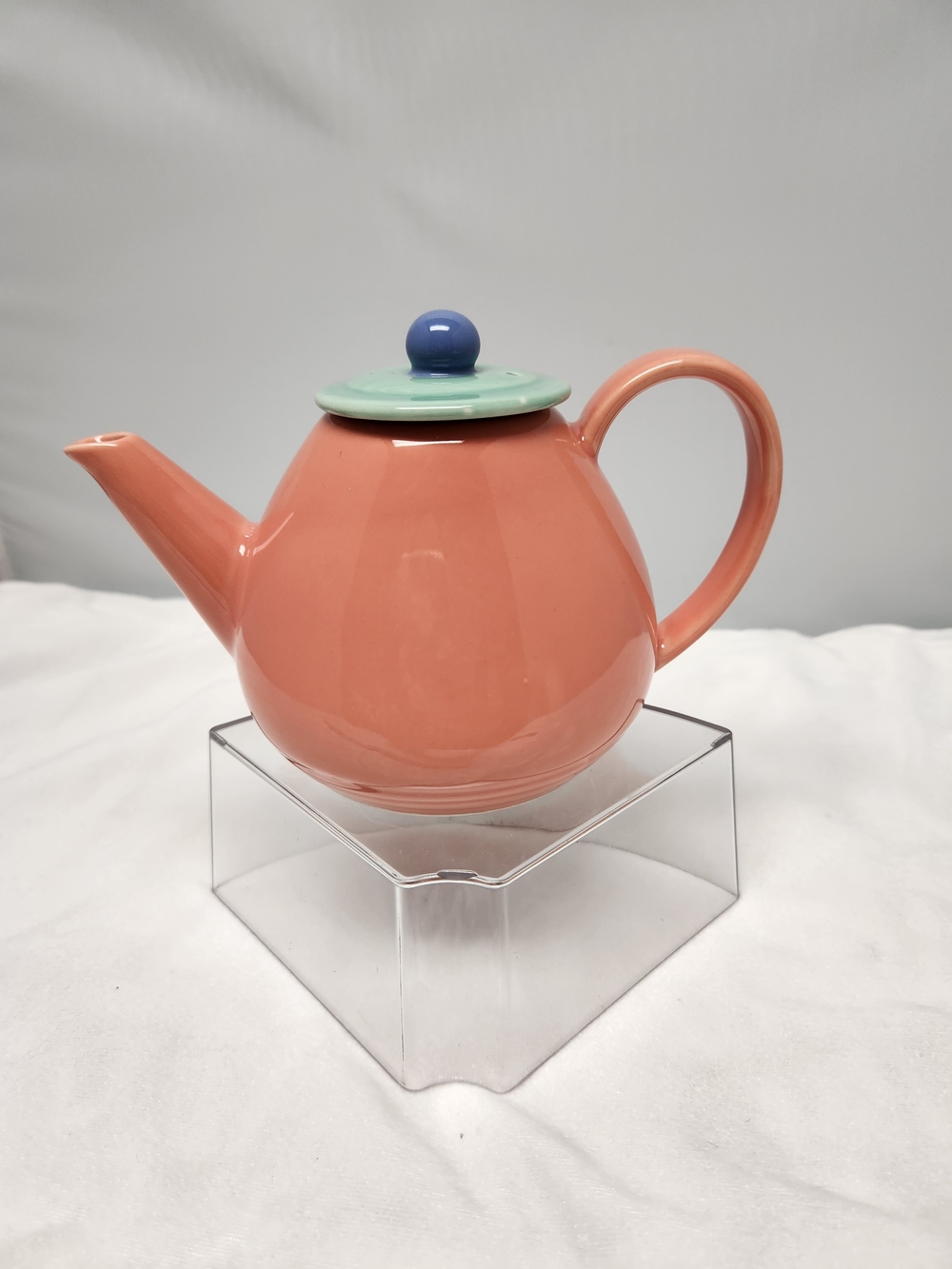 Coral Ceramic Teapot with Mint Lid and Blue Knob